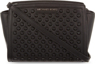 black studded messenger bag