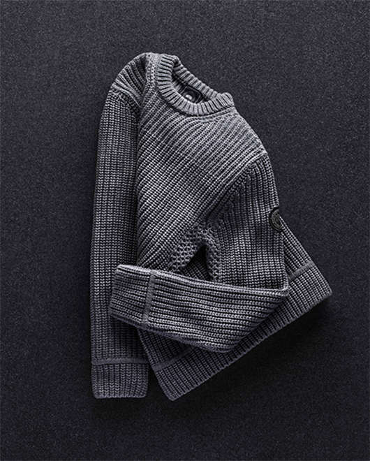 A men's grey knitted jumper