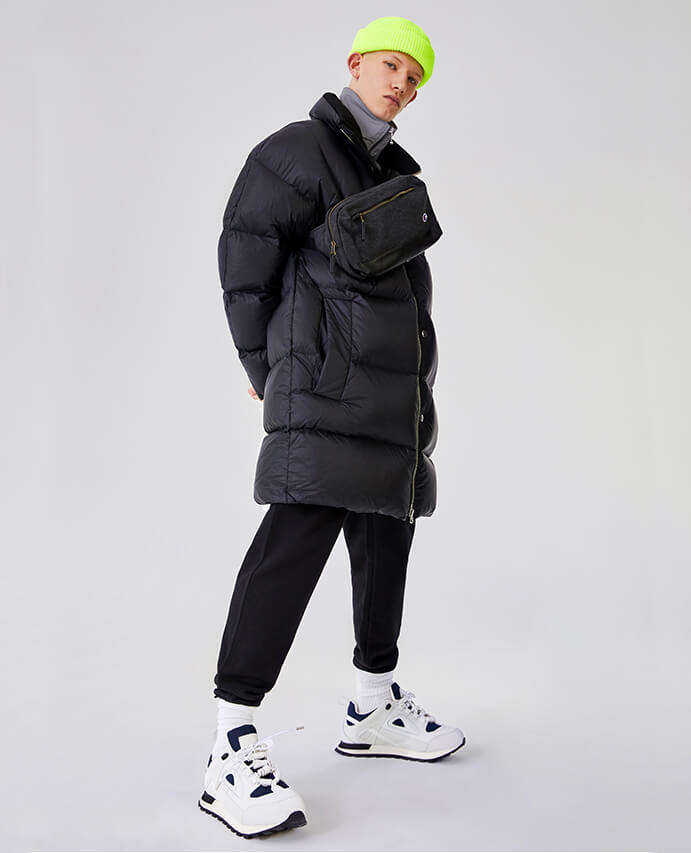 Acne Studios puffer jacket worn with Magic Stick jacket and Maison Margiela joggers and trainers