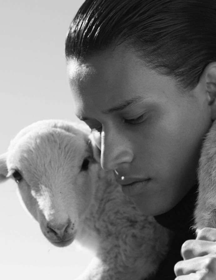 Male model with a lamb