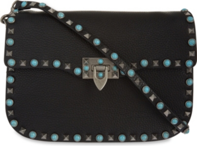 VALENTINO - Rockstud grained leather messenger bag | Selfridges.com