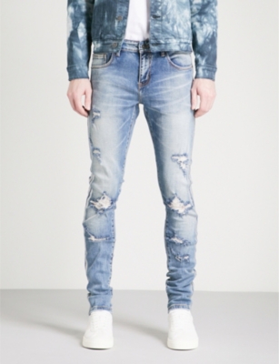 distressed jeans with side stripe
