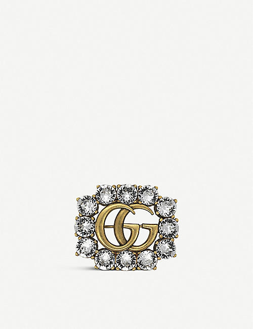 GUCCI: Double G gold and crystals brooch