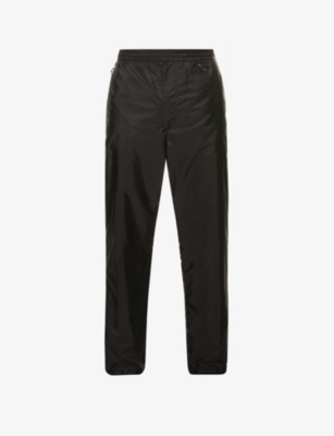 Brand-plaque relaxed-fit recycled-nylon tracksuit trousers(9310599)