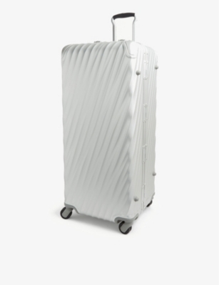 TUMI: International 19 Degree Trunk alumunium suitcase