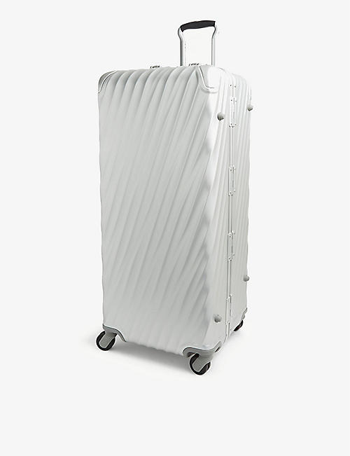 TUMI: International 19 Degree Trunk alumunium suitcase