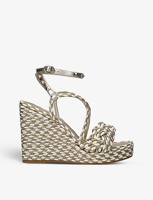 VALENTINO GARAVANI: Rockstud Torchon stud-embellished woven wedge sandals