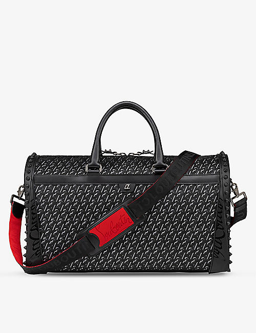 CHRISTIAN LOUBOUTIN: Sneakender studded leather duffle bag