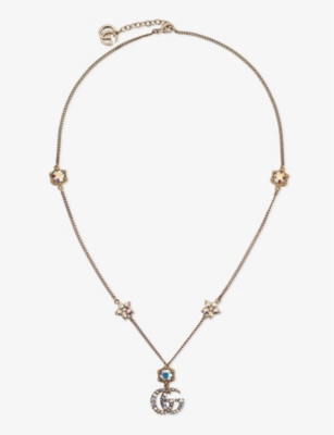 GUCCI: Fashion Show gold-toned brass pendant necklace