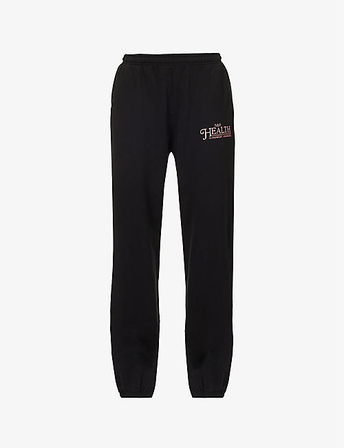 SPORTY & RICH: Resort tapered mid-rise cotton-jersey jogging bottoms