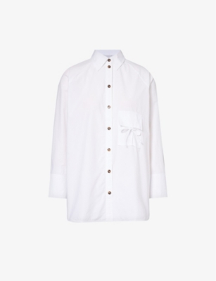 GANNI: Bow-embellished organic-cotton shirt