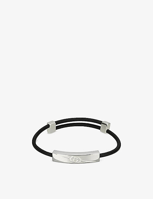 GUCCI: Diagonal engraved-interlocking G sterling silver and leather bracelet