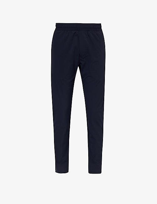 ARNE: Active elasticated-waist regular-fit tapered-leg stretch-woven trousers