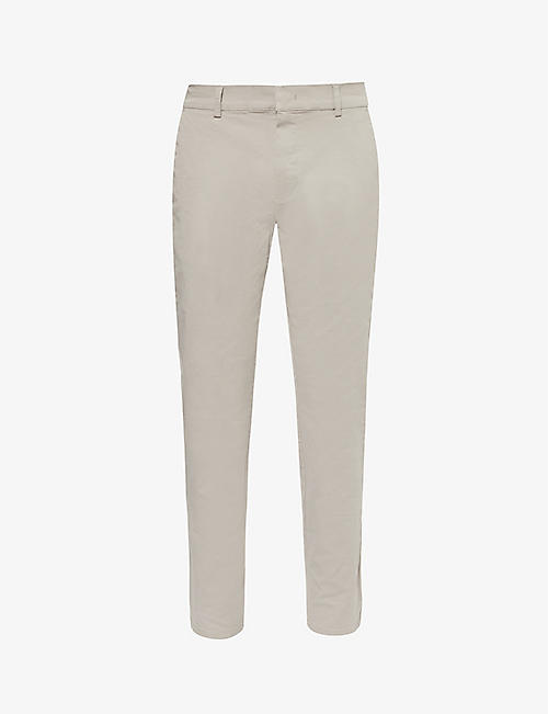 ARNE: Tapered-leg mid-rise stretch-cotton trousers