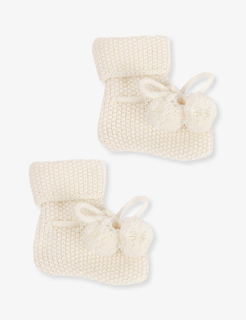 TROTTERS: Pom-pom knitted booties 0-9 months