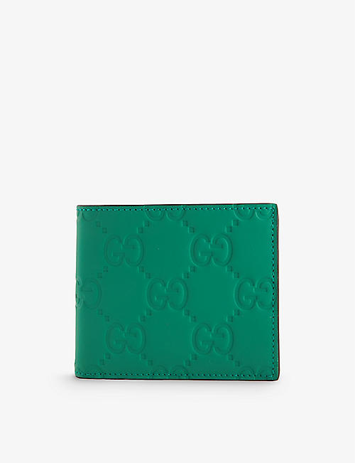 GUCCI: GG logo-debossed leather wallet