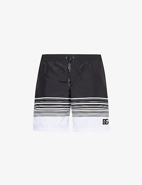 DOLCE & GABBANA: Striped brand-print swim shorts
