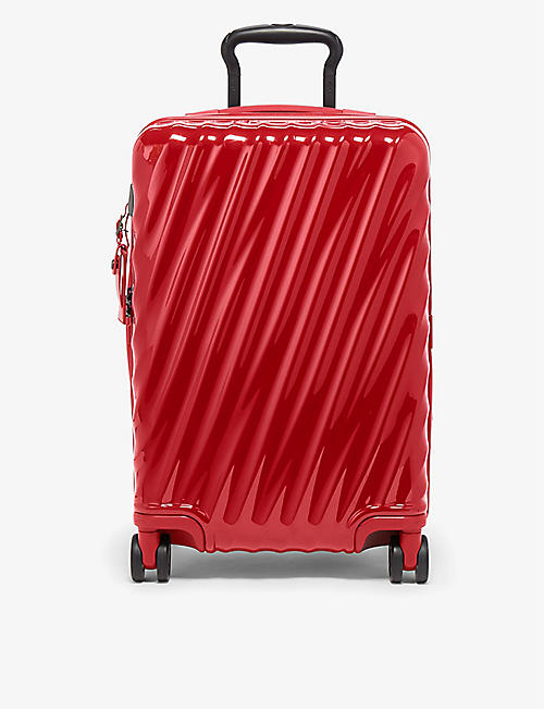 TUMI: International expandable 4-wheeled polycarbonate carry-on suitcase