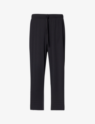 PLEATS PLEASE ISSEY MIYAKE: Pleated wide-leg mid-rise knitted trousers
