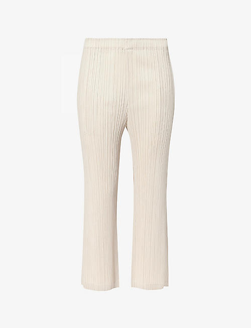 PLEATS PLEASE ISSEY MIYAKE: Pleated mid-rise flared-leg knitted trousers