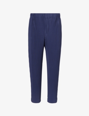 HOMME PLISSE ISSEY MIYAKE: Pleated tapered-leg regular-fit knitted trousers