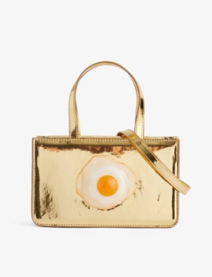 PUPPETS AND PUPPETS: Egg-appliqué small faux-leather top-handle bag