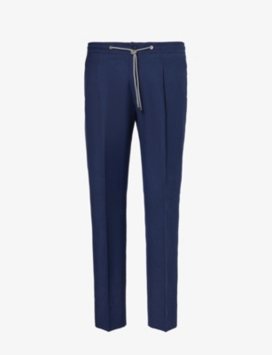 CORNELIANI: Drawstring-waist tapered-leg linen trousers
