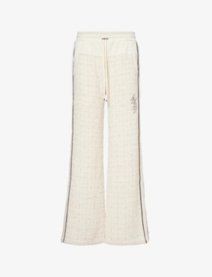 AMIRI: Bouclé-panel brand-embroidered woven trousers