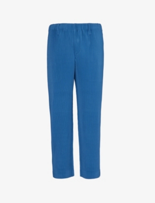 HOMME PLISSE ISSEY MIYAKE: Pleated tapered knitted trousers