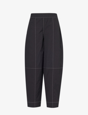 GANNI: Curved-leg mid-rise organic cotton-blend trousers
