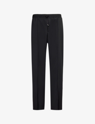 VALENTINO: Brand-appliqué tapered-leg wool-blend trousers