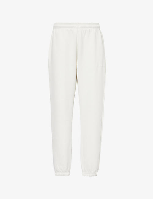 SISTERS & SEEKERS: Branded relaxed-fit cotton-blend jogging bottoms