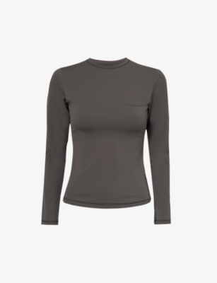 SISTERS & SEEKERS: Active slim-fit stretch-woven top