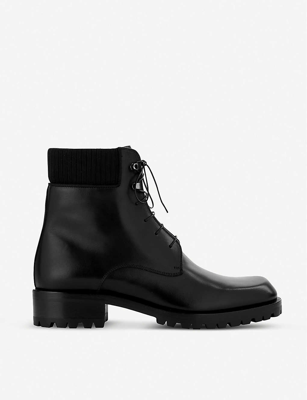 Shop Christian Louboutin Men's Black Trapman 20 Leather Ankle Boots
