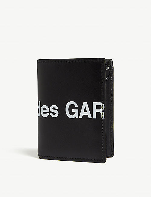 COMME DES GARCONS: Logo print leather wallet