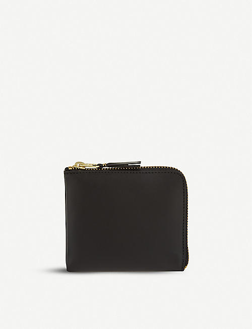 COMME DES GARCONS: Leather half-zip wallet