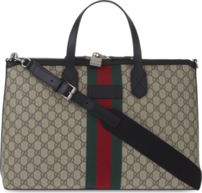 GUCCI - Supreme duffle bag | Selfridges.com