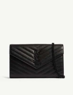 monogram quilted leather envelope clutch