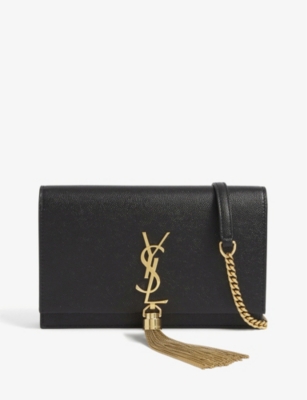 SAINT LAURENT - Kate Tassel Monogram leather clutch | Selfridges.com