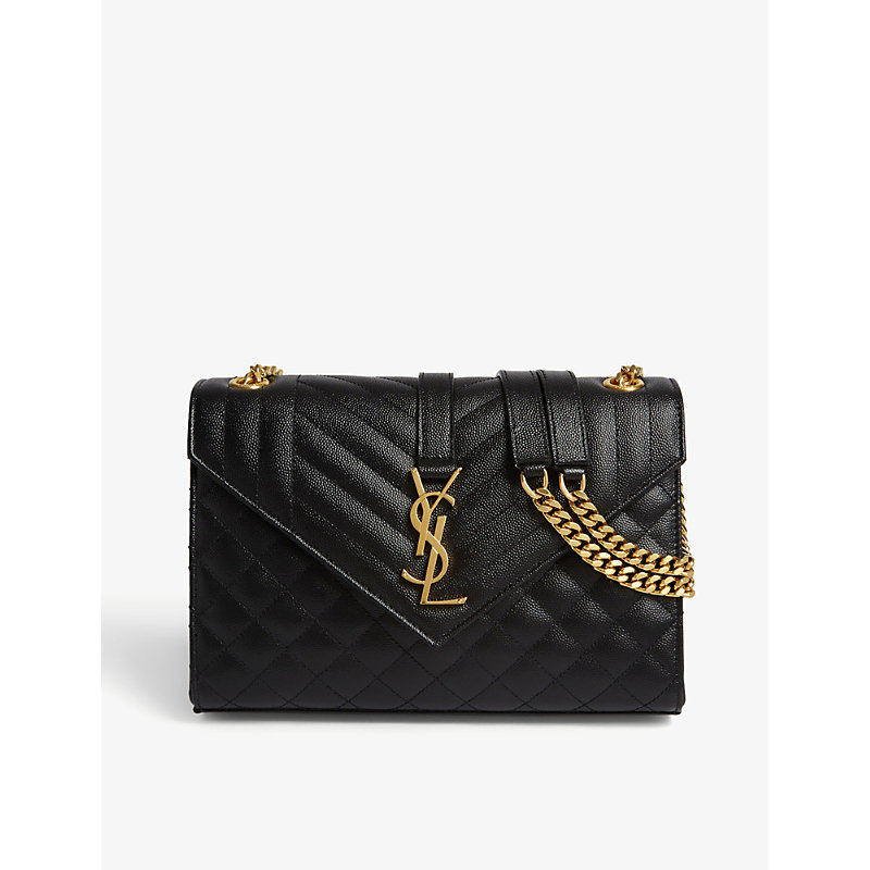 Shop Saint Laurent Black/gold Monogram Quilted Leather Satchel Bag In Black Gold