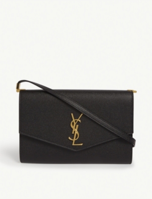 SAINT LAURENT - Uptown grained leather cross-body bag | Selfridges.com