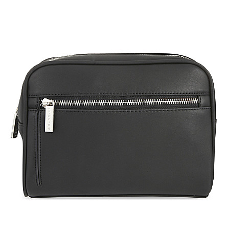 SKINNYDIP - Leather wash bag | Selfridges.com