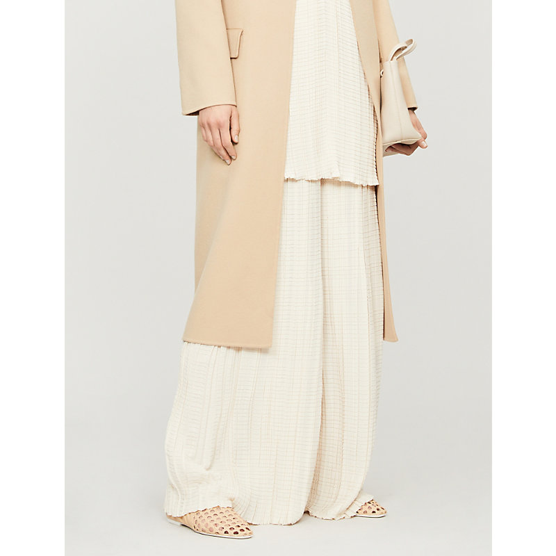 THE ROW ARYA HIGH-RISE PLEATED CREPE FLARED TROUSERS