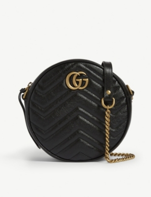 GUCCI: Marmont round leather quilted camera bag