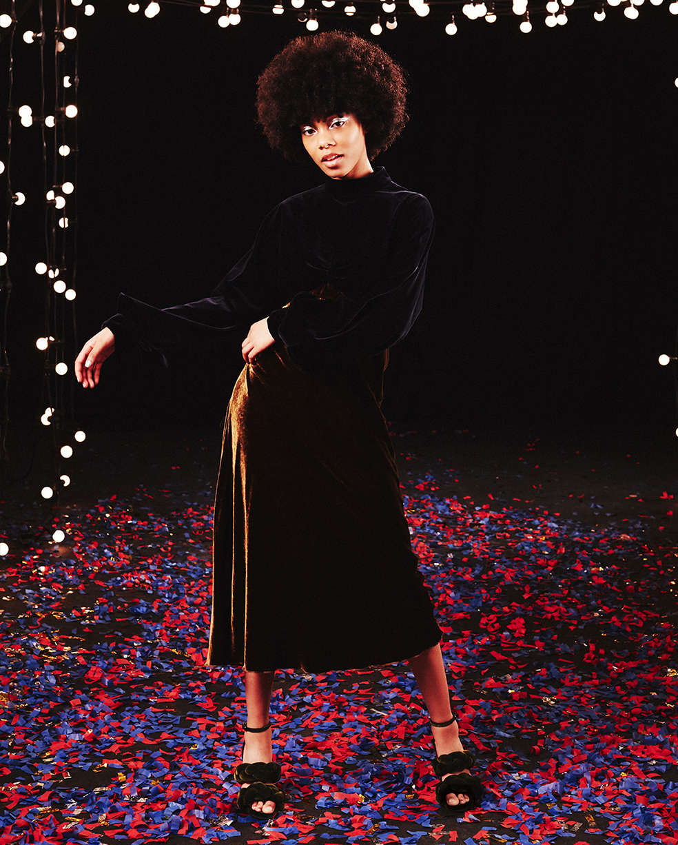 Woman wearing Dries Van Noten velvet dress