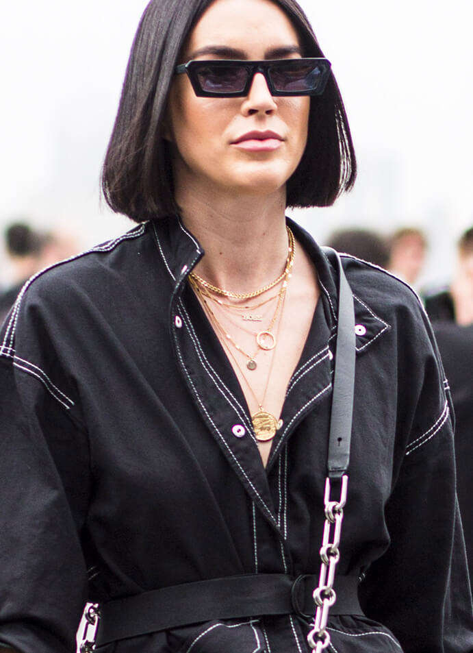 Street style image of lady wearing necklaces