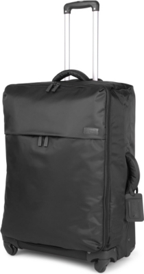 black four wheel suitcase