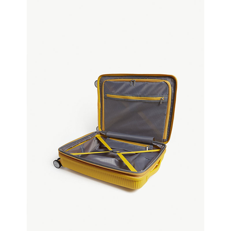 Shop American Tourister Golden Yellow Soundbox Expandable Four-wheel Cabin Suitcase 55cm