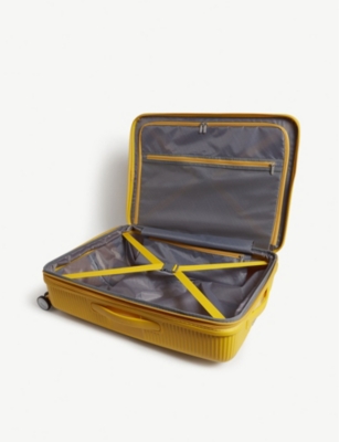 Shop American Tourister Golden Yellow Soundbox Expandable Four-wheel Suitcase 67cm