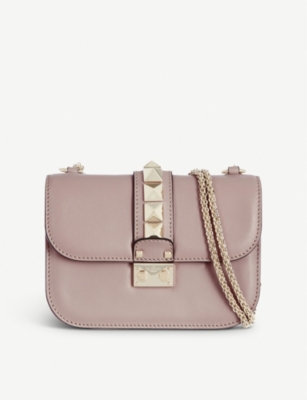 VALENTINO - Stud lock small shoulder bag | Selfridges.com